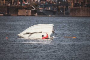 capsized boat in water