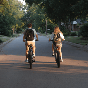 Tulsa teenagers going to school on their e-bikes