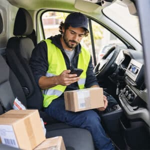 delivery driver scanning package